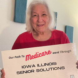 lady holding medicare sign